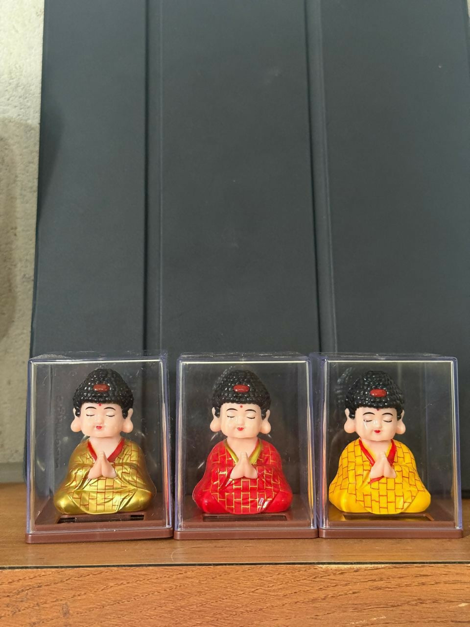 Solar Powered Buddha Bobble Head in Clear Display Case (Color may vary)